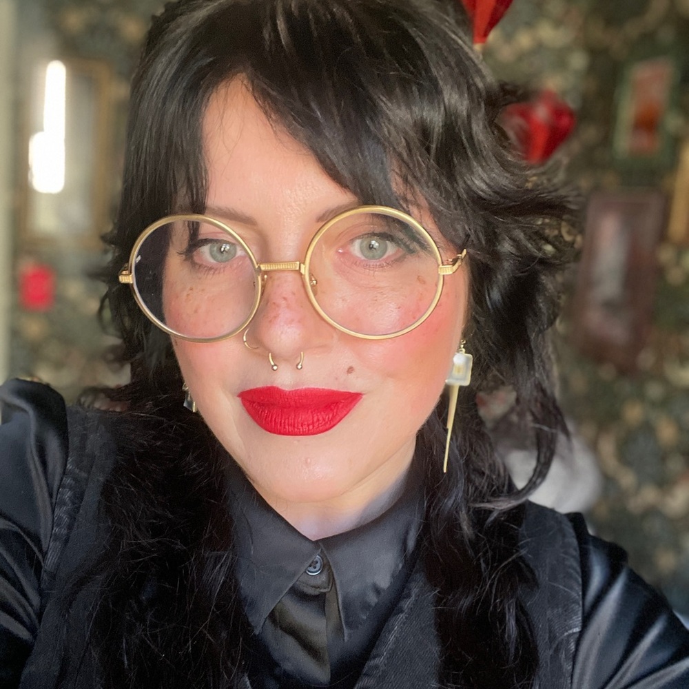 Gold round glasses